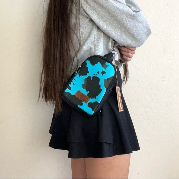 Wrangler Turquoise Cow Print Sling Bag - Picture 2 of 11